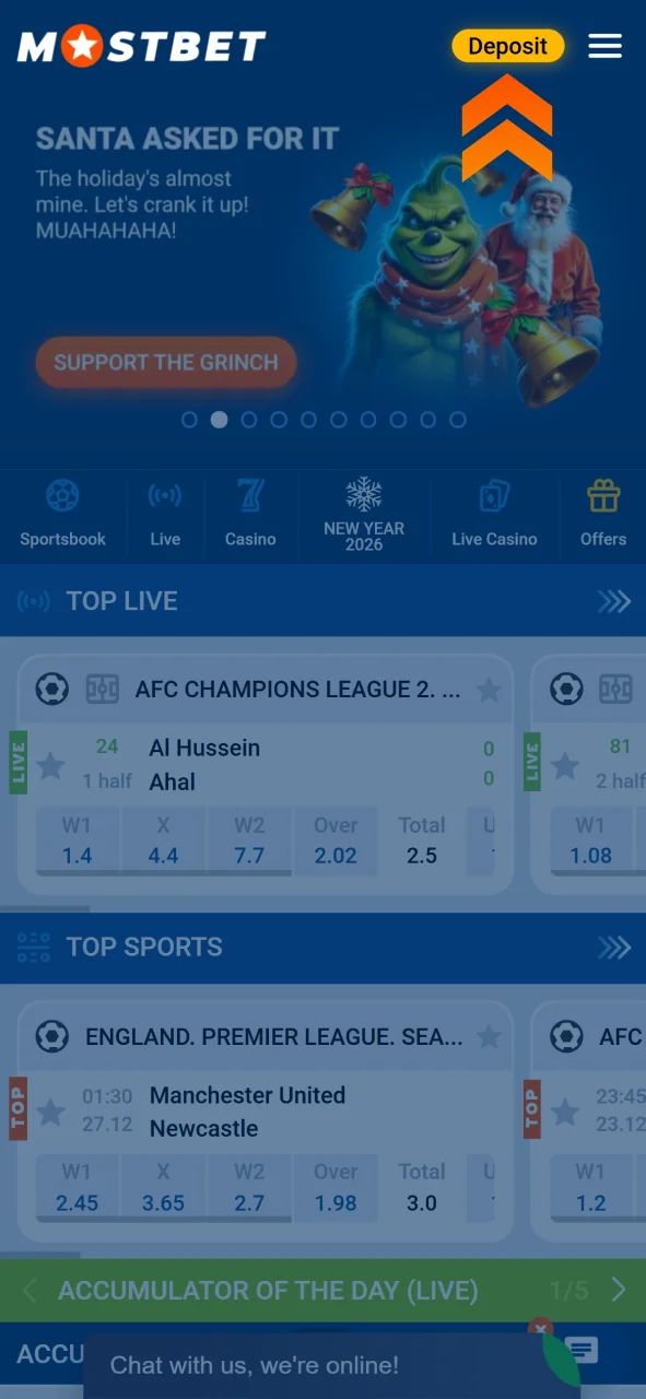 Add funds to your Mostbet account using the Deposit button.